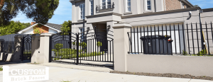 Custom Built Fences Rendered fence with Steel Spear top fence
