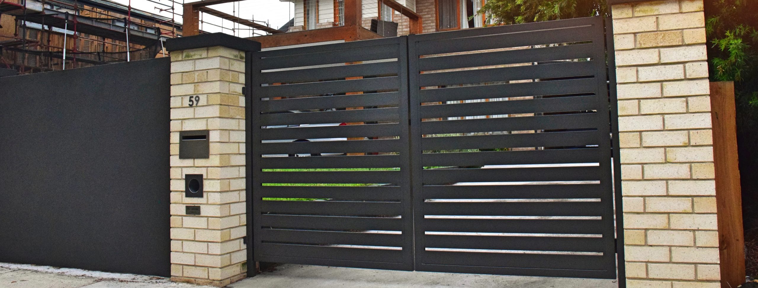 Double Aluminium Gates designed and built by Custom Built Fences