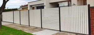 Alimunium vertical and horizontal slat fence designed and built by Custom Built Fences