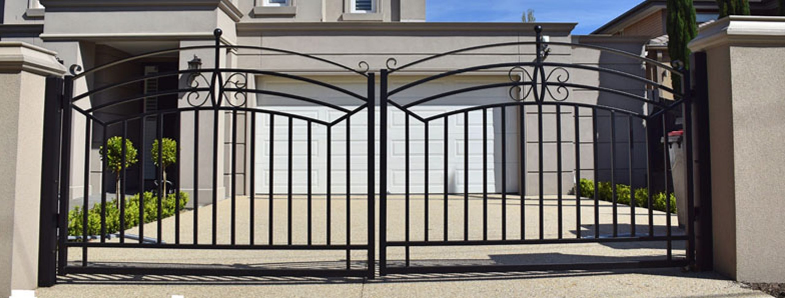 Decorative steel double gates designed and built by Custom Built Fences